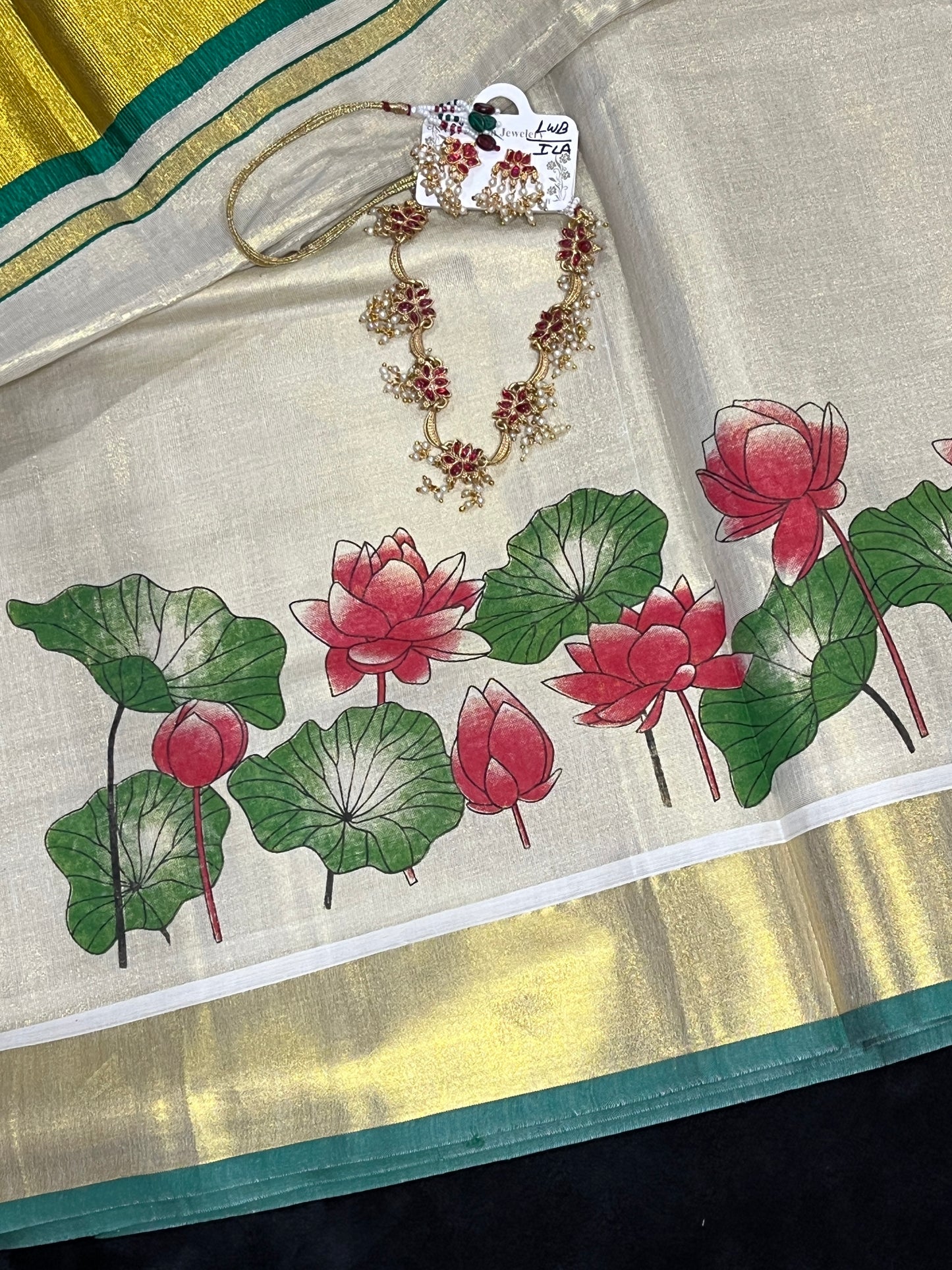 Tissue Saree with Reddish Pink Thamara Print