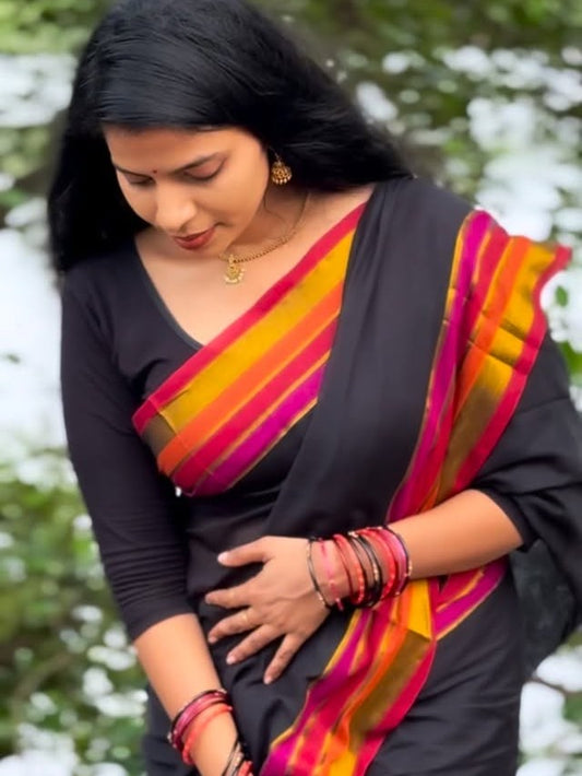 Midnight Muse: Deep Black Mul Cotton Saree with Sunset Borders