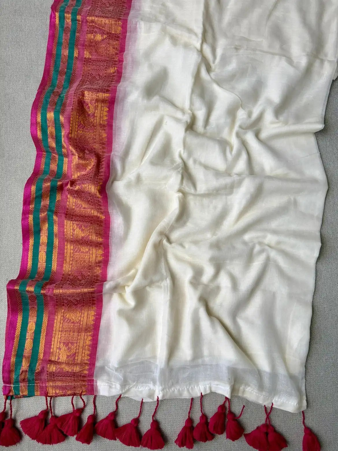 Timeless Radiance: Off-White Mul Cotton Saree with Pale Pink & Peacock Green Kanchi Borders