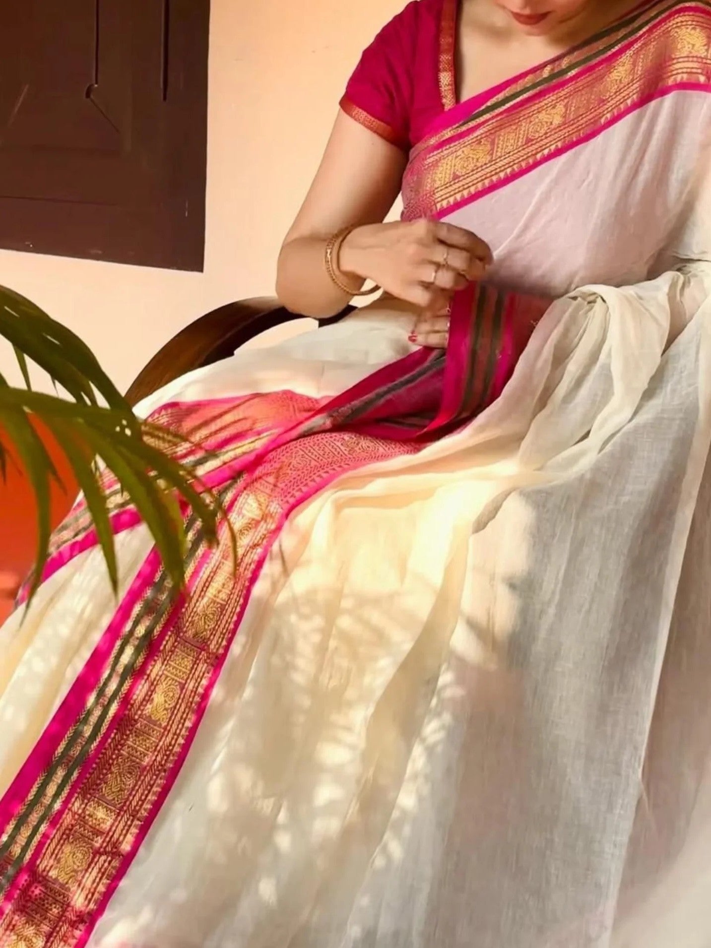 Timeless Radiance: Off-White Mul Cotton Saree with Pale Pink & Peacock Green Kanchi Borders