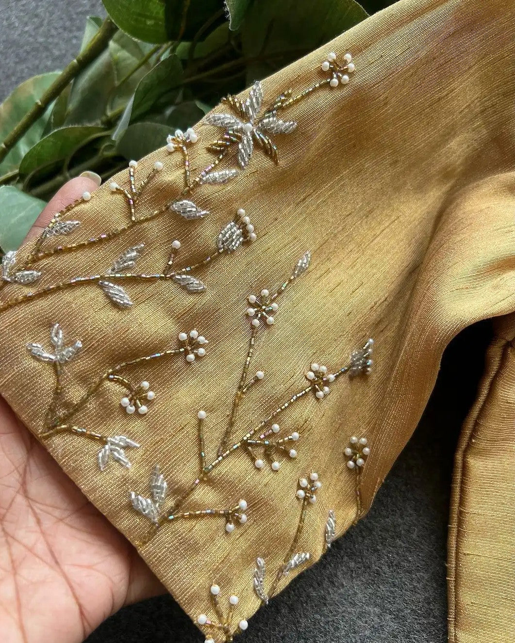 Silk blouse with handwork on sleeve