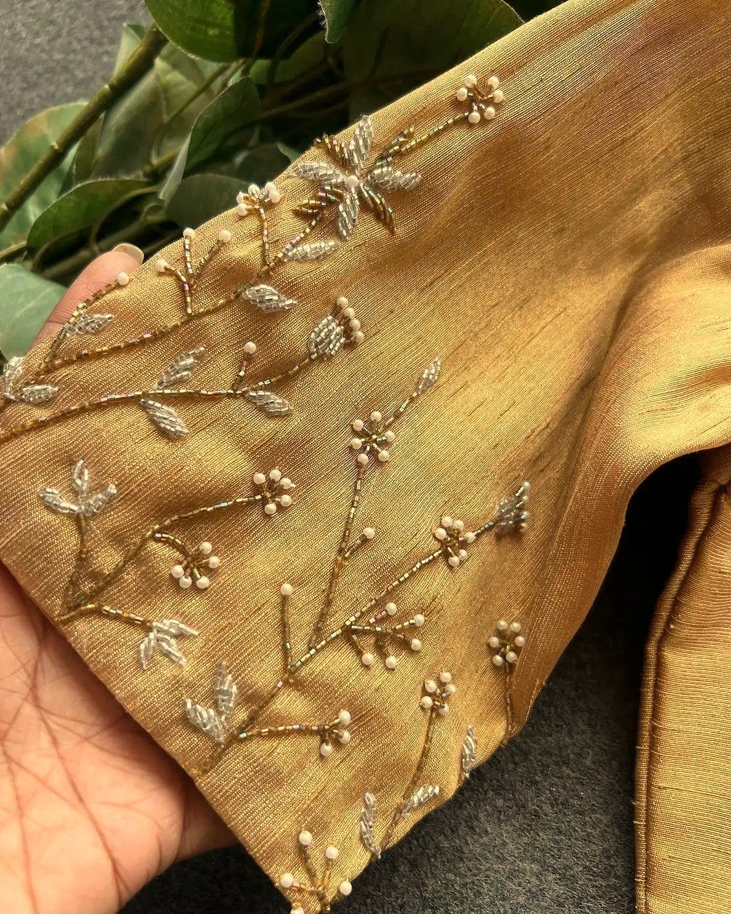 Silk blouse with handwork on sleeve